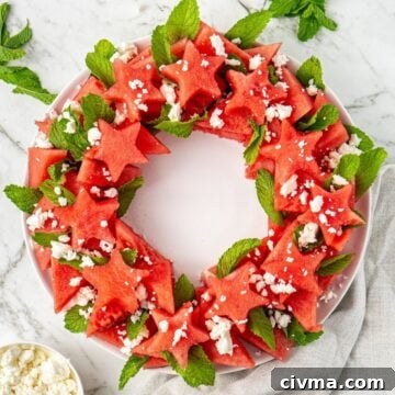 Watermelon and Feta Wreath Salad, arranged on a round white platter.