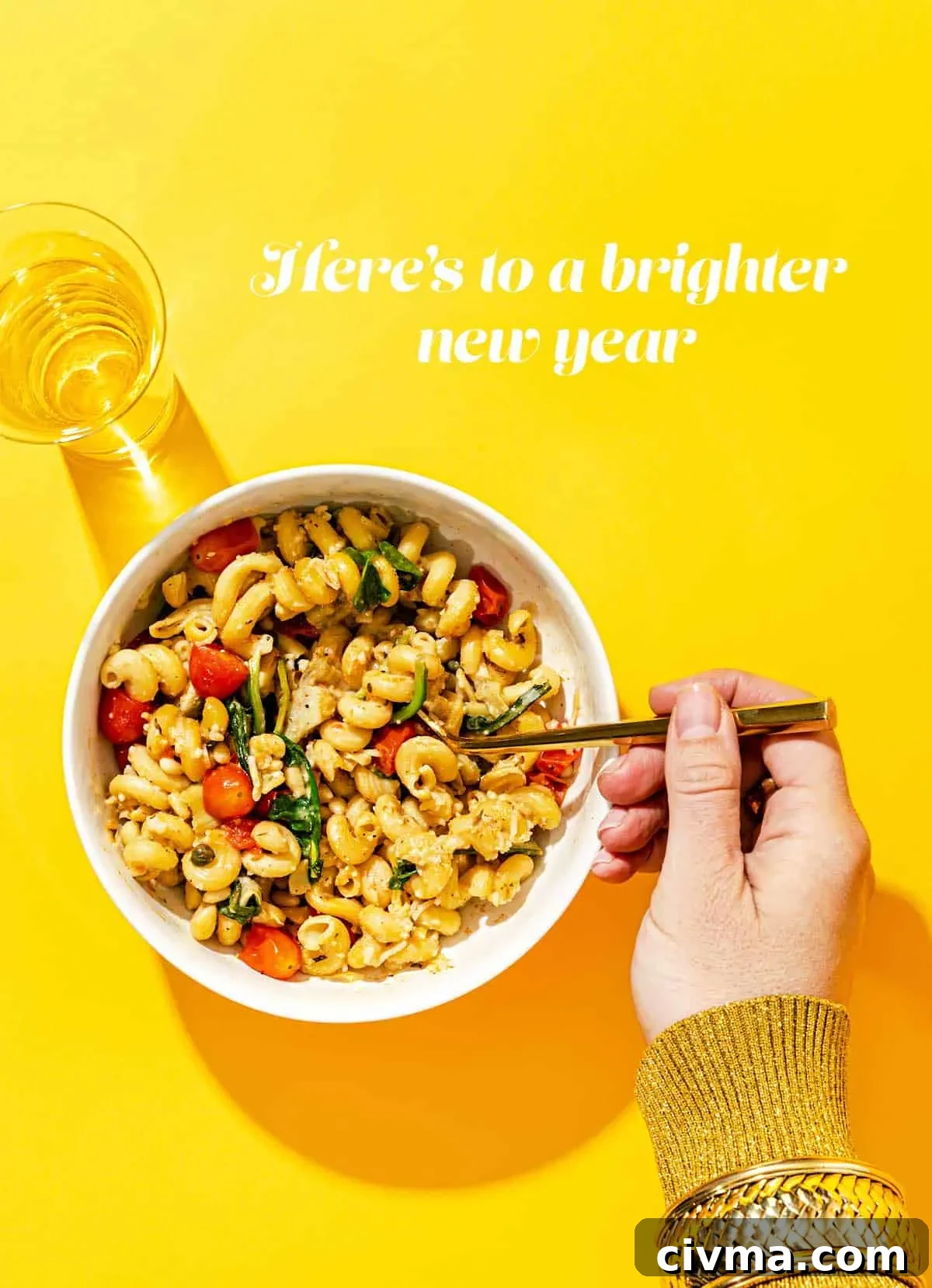 VYA 2020: Top 10 Posts You Missed 17 Bowl of pasta with hand holding fork, and champagne flute on a yellow background