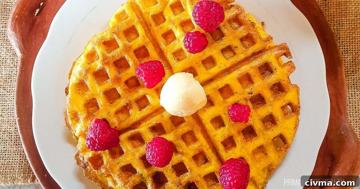 Keto waffles on a white plate.